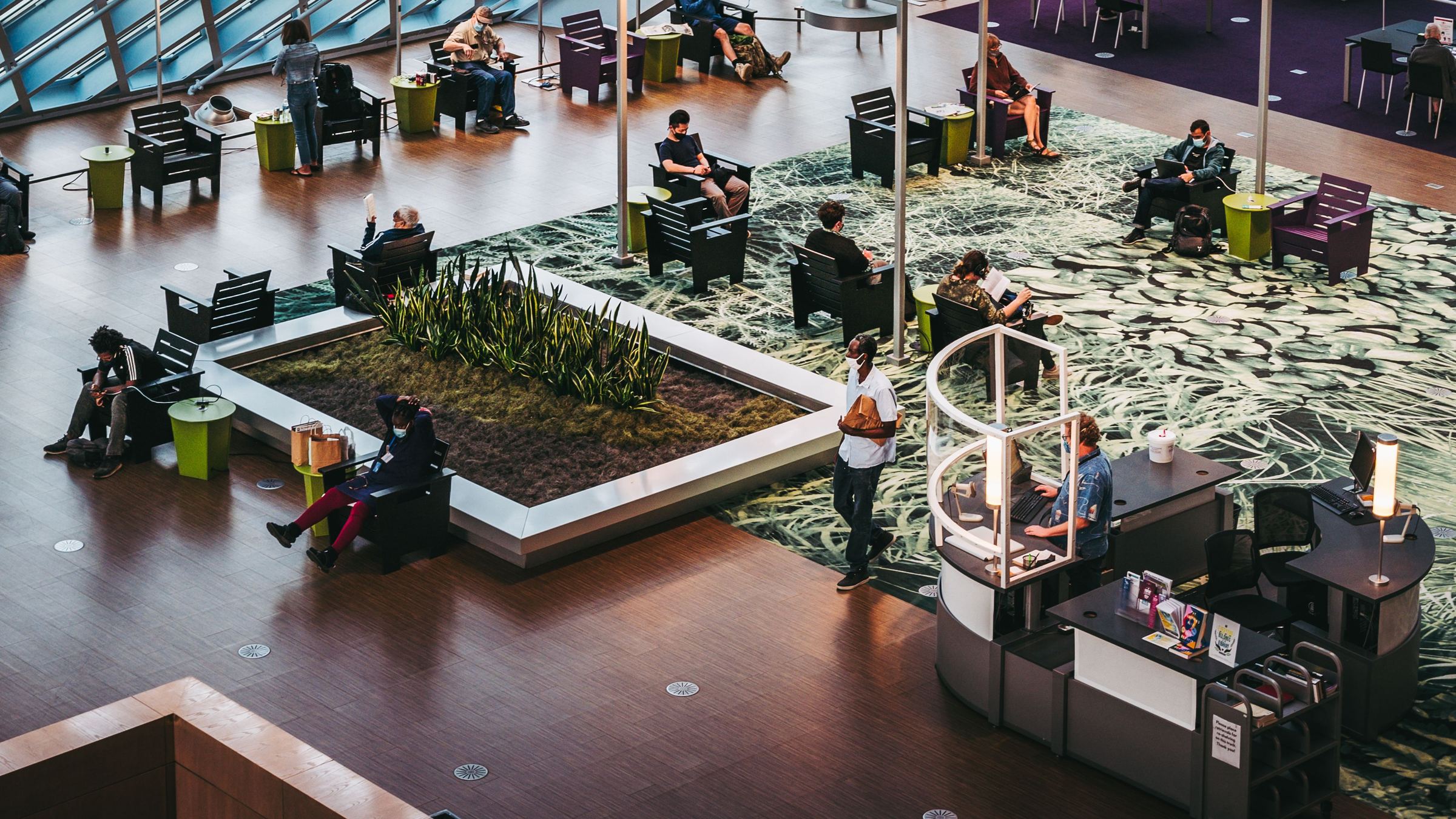 People working in an open-plan workspace
