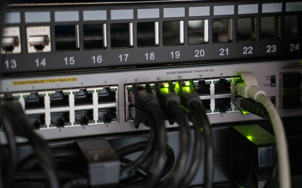 Network switch with patched cables and link lights