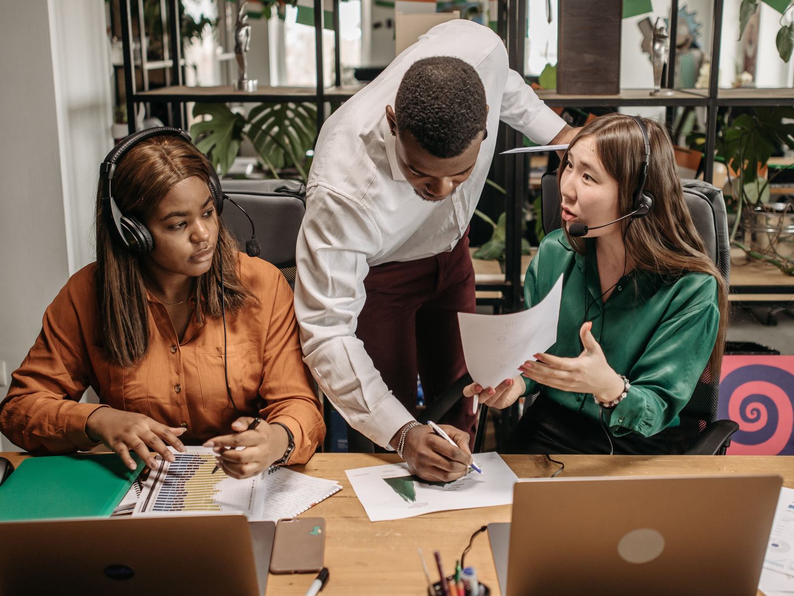 Team reviewing reports together at a desk